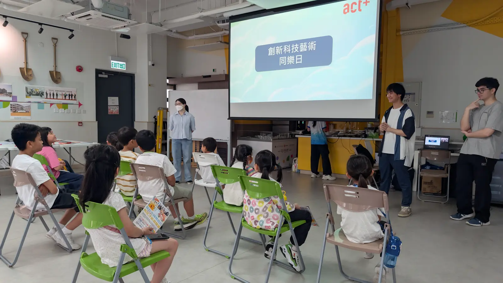 Young participants joining a traditional lion dance activity.